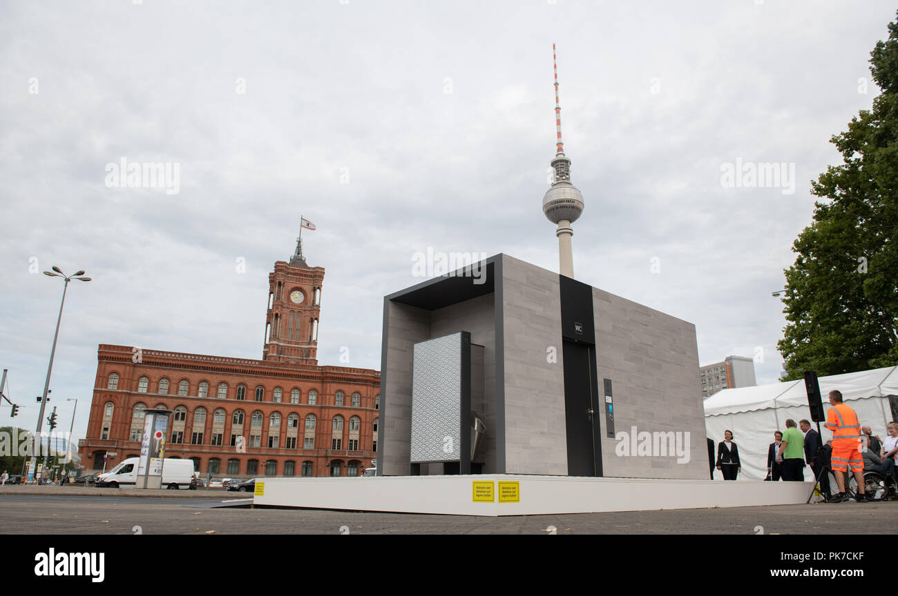 11 September 2018, Berlin: A prototype of the new city toilet is available at a press event not far from the Red Town Hall. Wall GmbH will build the new modular houses in the city from 2019. Photo: Paul Zinken/dpa Stock Photo