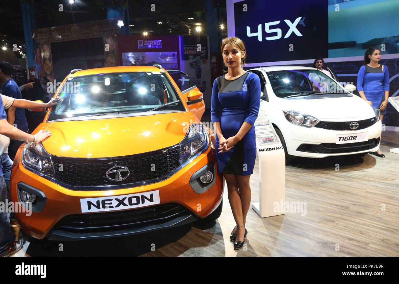 Kathmandu, Nepal. 11th Sep, 2018. Models pose with cars at the Nepal Automobile Dealers' Association (NADA) Auto Show 2018 in Kathmandu, capital of Nepal, Sept. 11, 2018. The 13th NADA Auto Show aims at enticing the modern and technological advancements to auto enthusiasts ahead of festive season. Credit: Sunil Sharma/Xinhua/Alamy Live News Stock Photo