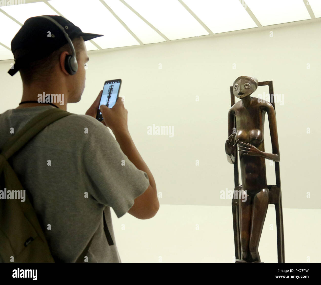 New York City, New York, USA. 11th Sep, 2018. An art goer takes a photo ...