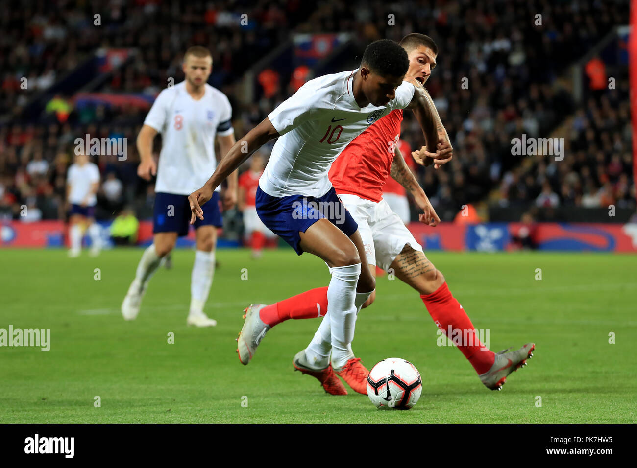 King Power Stadium, Leicester, UK. 11th Sep, 2018. International Football Friendly, England versus Switzerland; Marcus Rashford of England competes for the ball with Steven Zuber of Switzerland Credit: Action Plus Sports/Alamy Live News Stock Photo