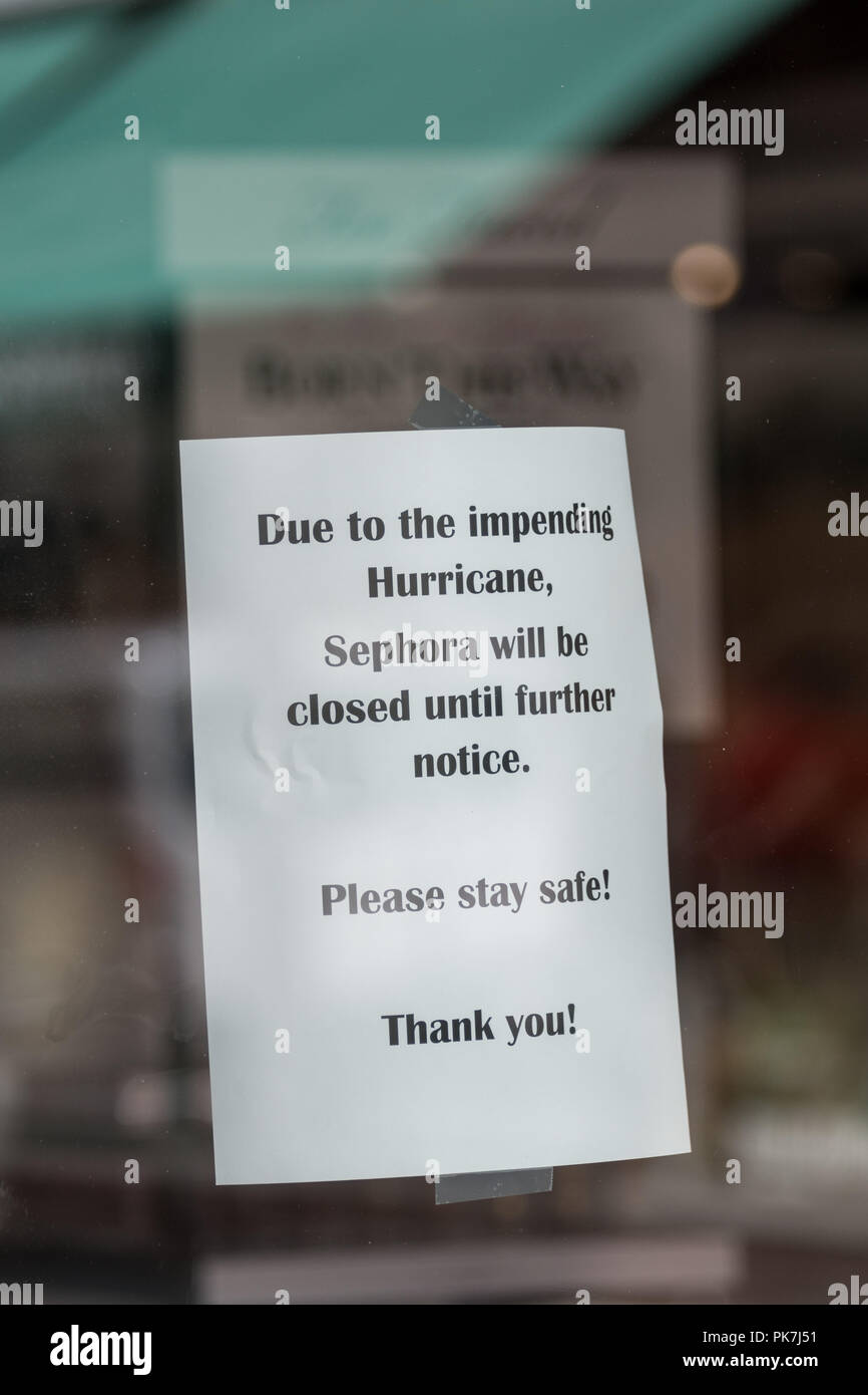 Isle of Palams, South Carolina, USA. 11th Sept, 2018. Sign on a shop saying closed for the hurricane on the historic King Street shopping district in preparation for approaching Hurricane Florence September 11, 2018 in Charleston, South Carolina. Florence, a category 4 storm, is expected to hit the coast between South and North Carolina and could be the strongest storm on record for the East Coast of the United States. Credit: Planetpix/Alamy Live News Stock Photo