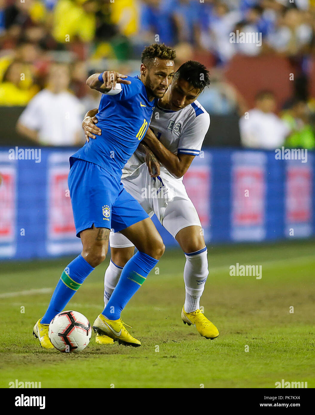 Washington DC, USA. 11th Sep, 2018. Brazil Forward #10 Neymar Jr controls the ball as he looks for a place to pass it during an International friendly soccer match between Brazil and El Salvador at Fedex Field in Washington DC. Justin Cooper/CSM/Alamy Live News Stock Photo