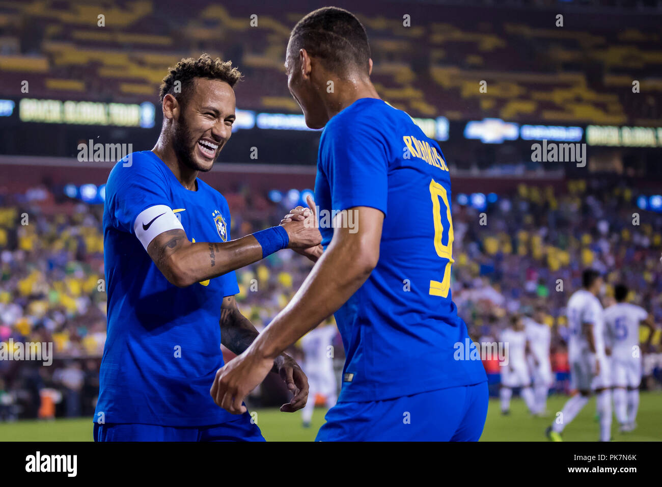 Landover, Maryland, USA. 11th Sep, 2018. Brazil forward Richarlison (9) celebrates with forward Neymar (10) after scoring during the first half of an International Friendly match between Brazil and El Salvador at FedExField in Landover, Maryland. Scott Taetsch/CSM/Alamy Live News Stock Photo