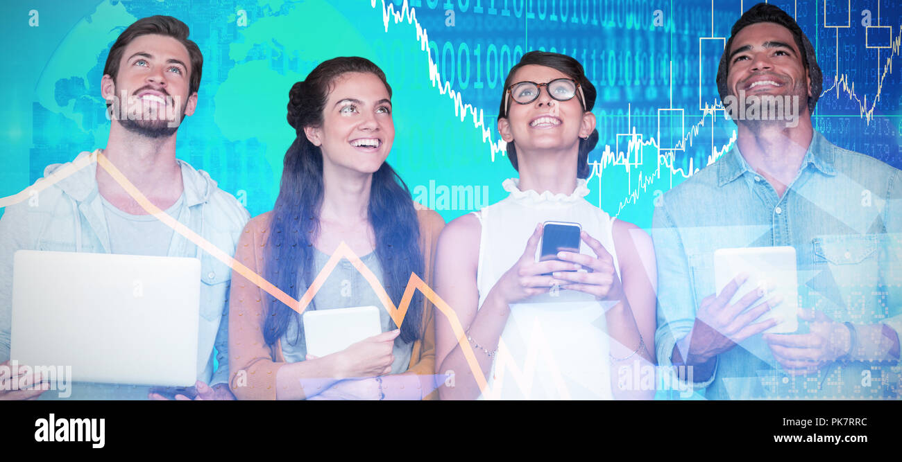 People Smiling While Using Technology Composite image of smiling business people holding technology while ...