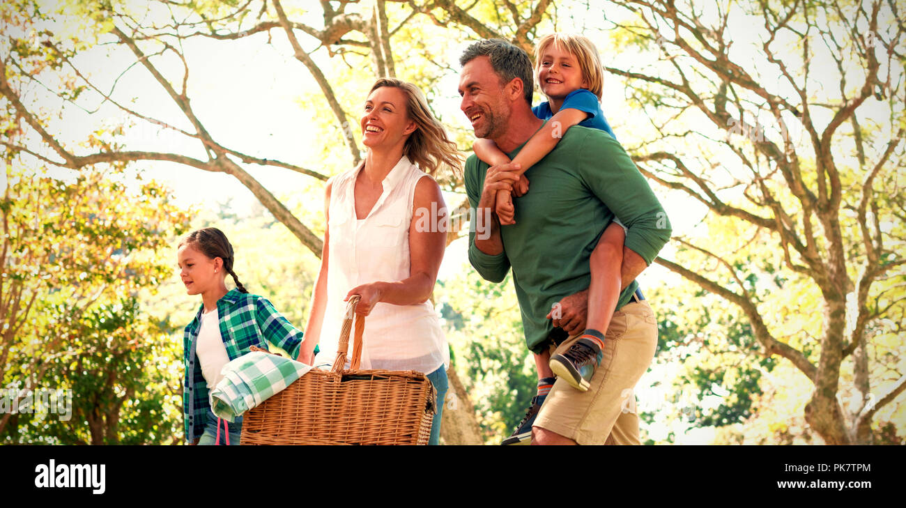 Family arriving in the park for picnic on a sunny day Stock Photo - Alamy
