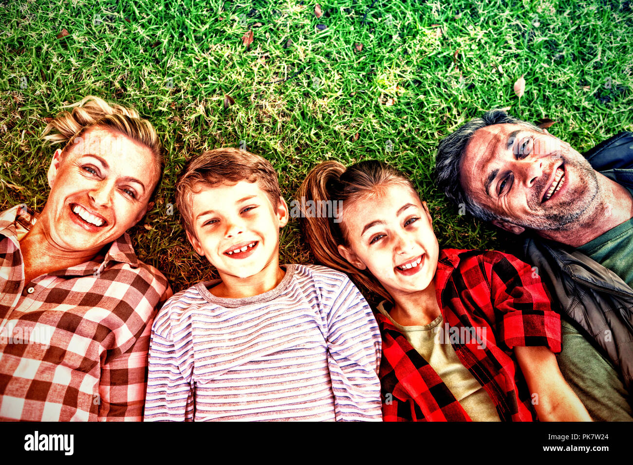 Boy lying in grass hi-res stock photography and images - Alamy