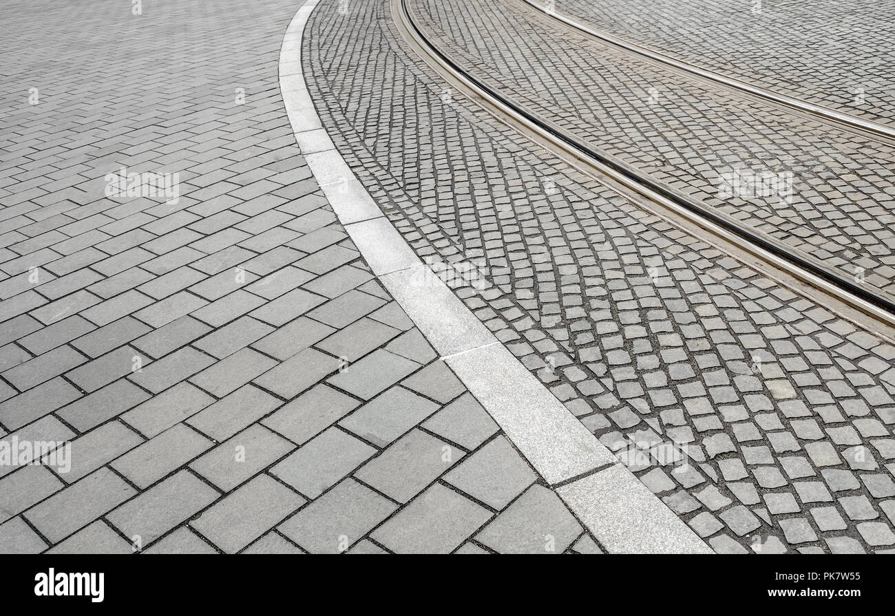 Traces of tram tracks on the road. Stock Photo