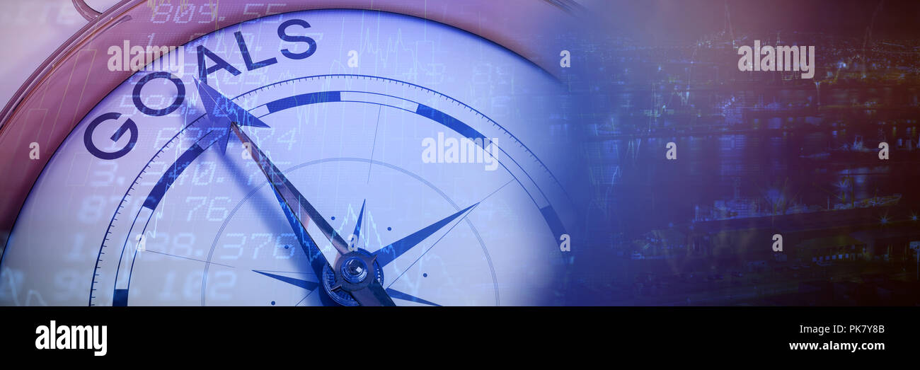 Composite image of compass pointing to goals Stock Photo