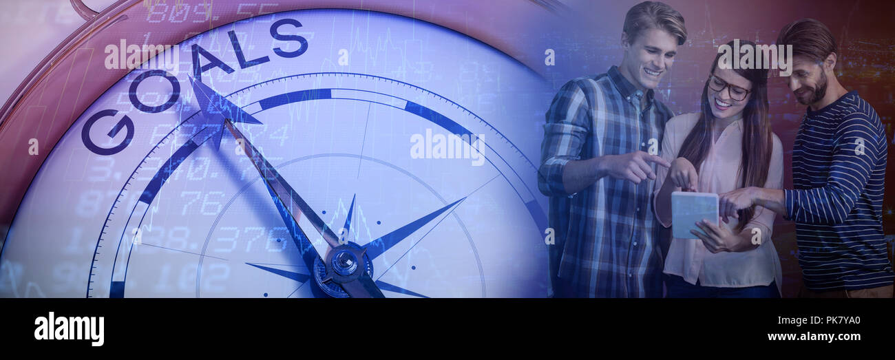 Composite image of business people pointing while using digital tablet Stock Photo