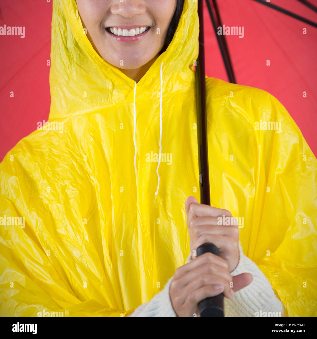 Yellow raincoat hi-res stock photography and images - Alamy