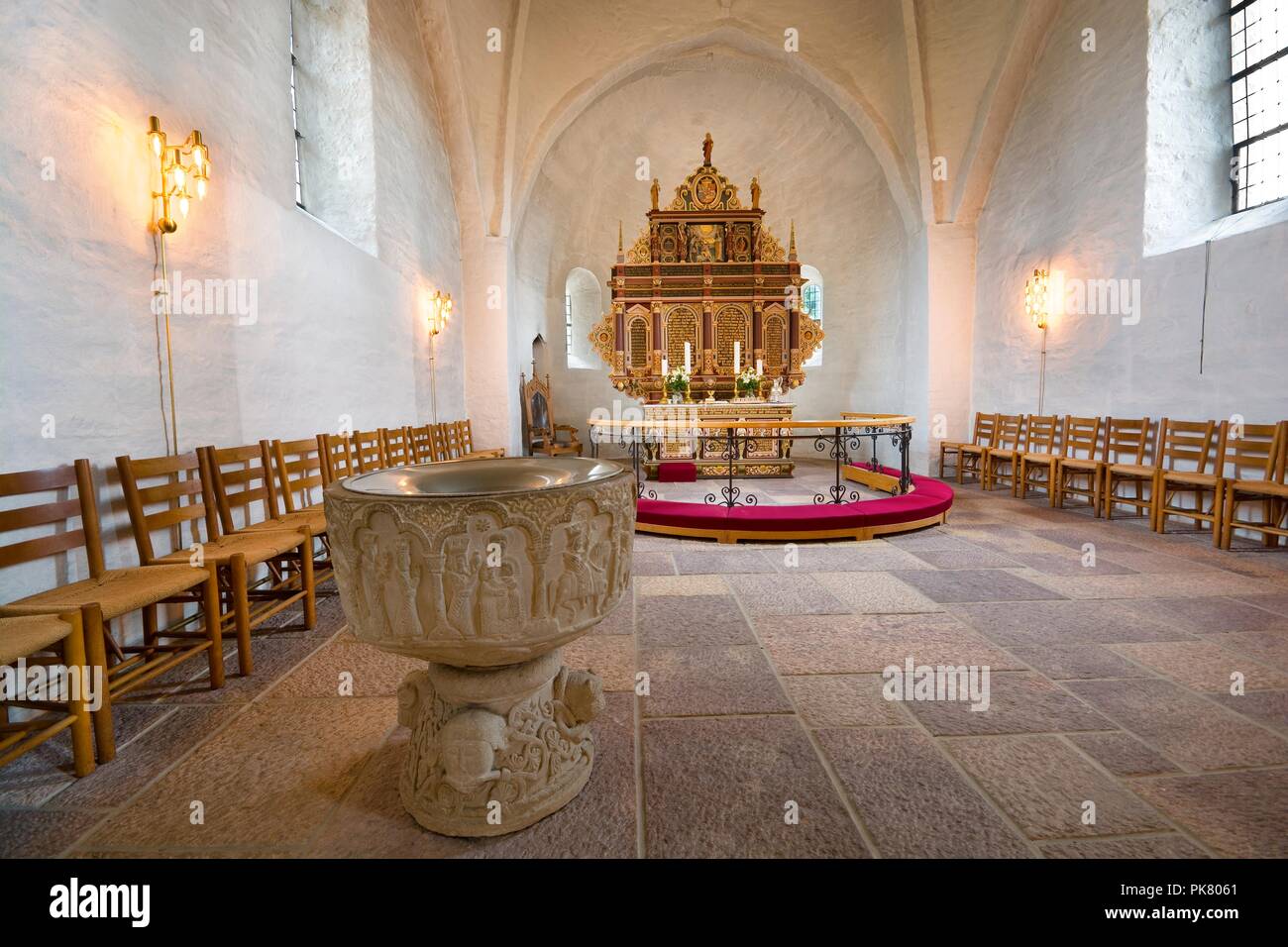 AAKIRKEBY, DENMARK - AUGUST 19, 2018: Interior of Aa church. It is the biggest and oldest church on the Bornholm island. Well known for ornamented fon Stock Photo