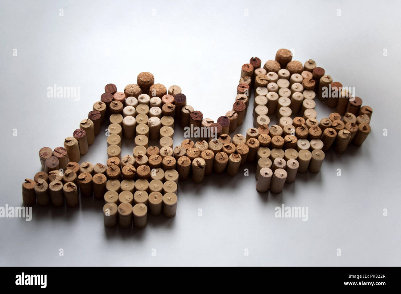 Wine corks suspension bridge abstract composition on white background Stock Photo