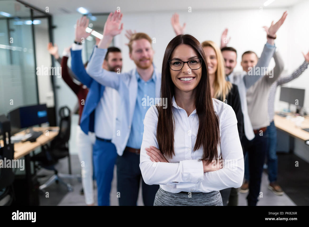 Group picture of business team posing in office Stock Photo - Alamy
