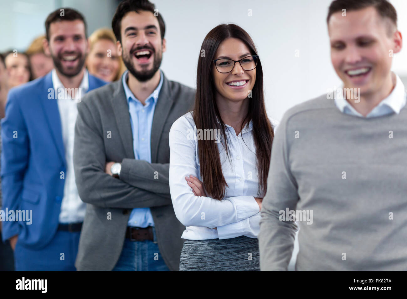 Group picture of business team posing in office Stock Photo - Alamy