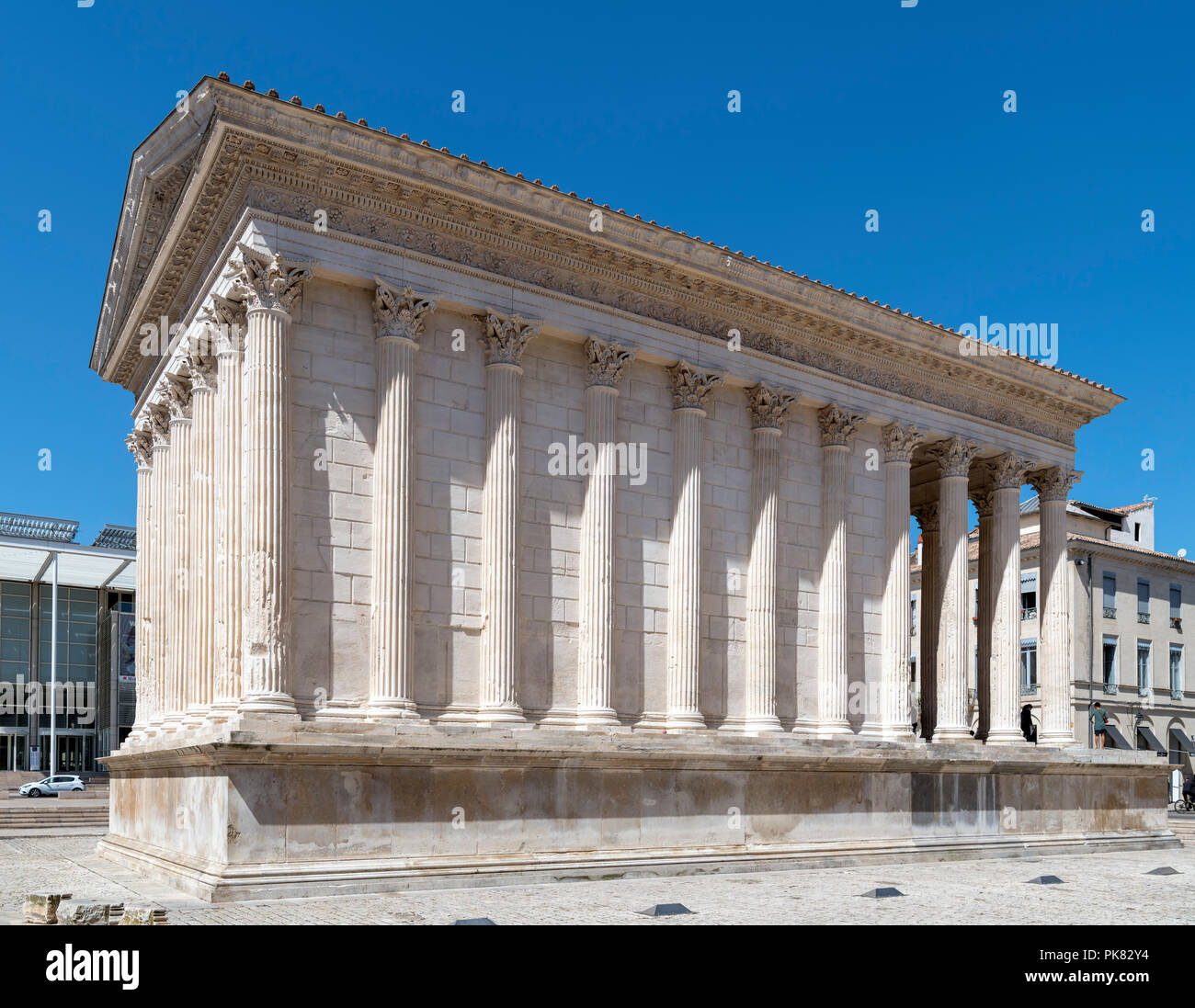 The Maison Carree roman temple, Place de la Maison CarrÃ©e, Nimes, Languedoc, France Stock Photo