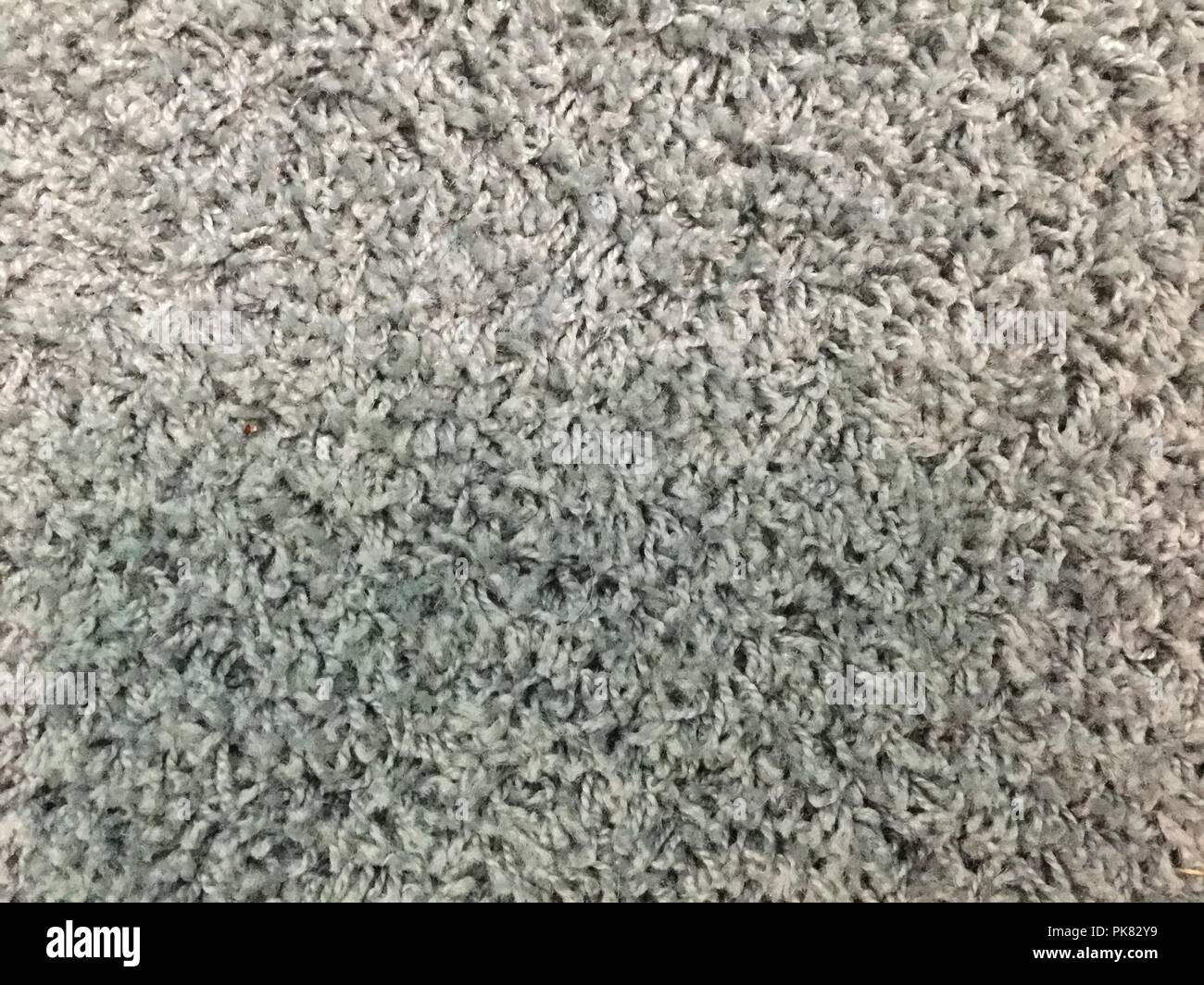 Gray textures background, carpet or rug closeup. Stock Photo