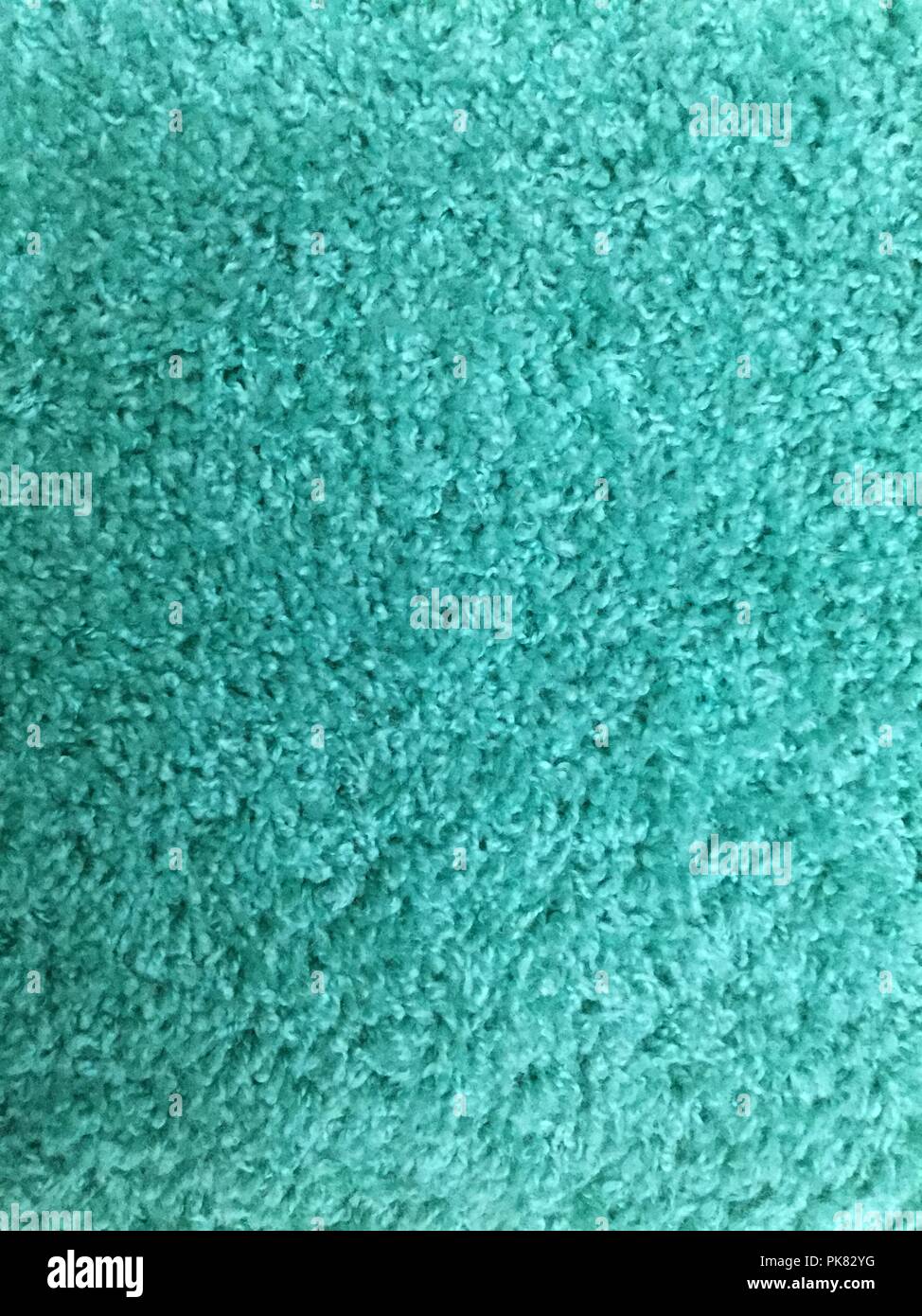 Aqua carpet closeup showing textures, background. Stock Photo