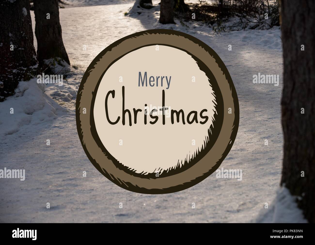 Merry Christmas text with snow forest Stock Photo