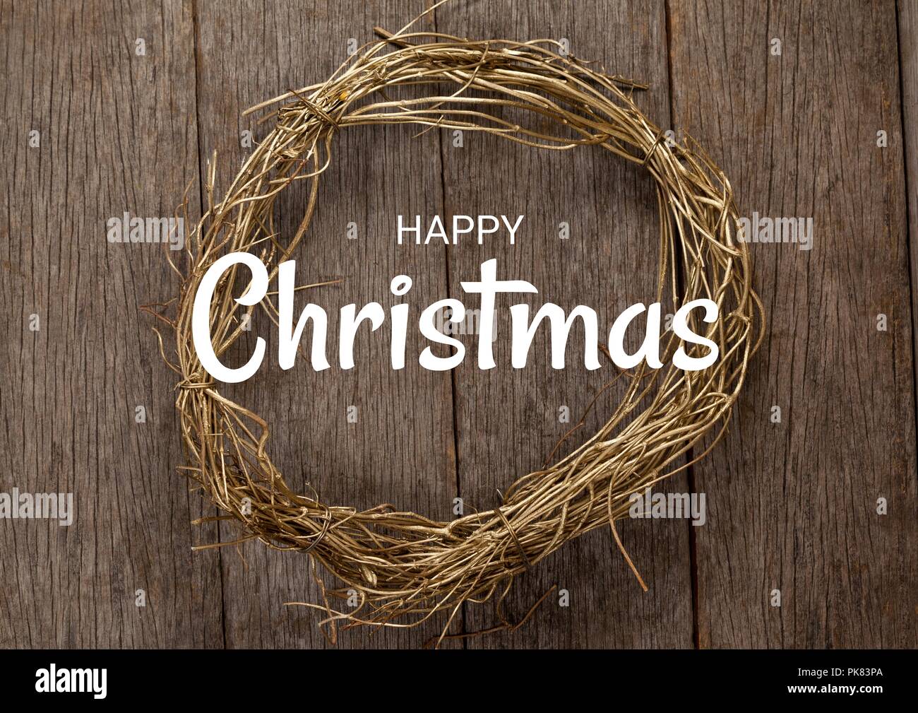 Happy Christmas text with wreath Stock Photo