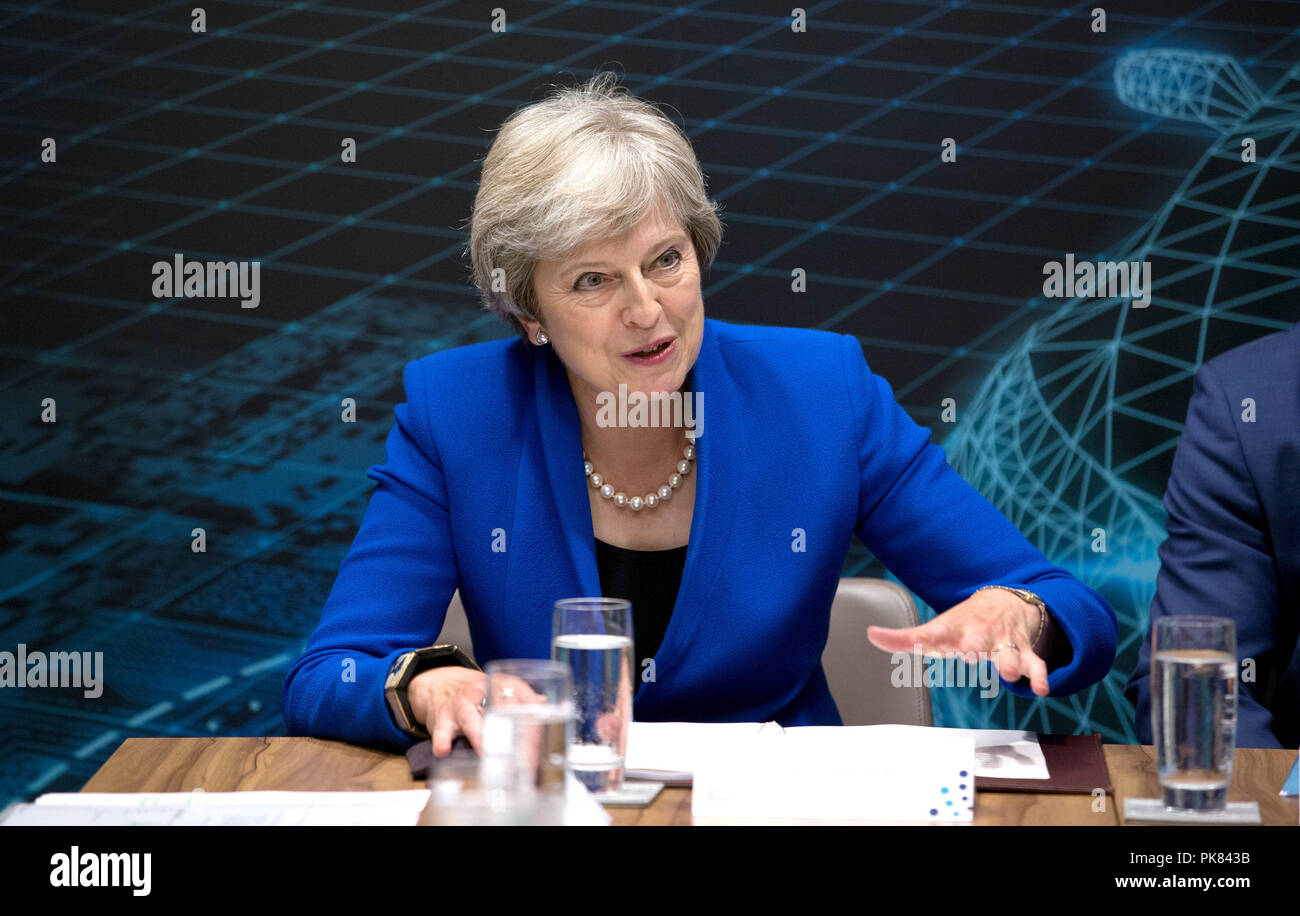 Prime Minister Theresa May during the Zero Emission Vehicle Summit at the ICC in Birmingham. Stock Photo