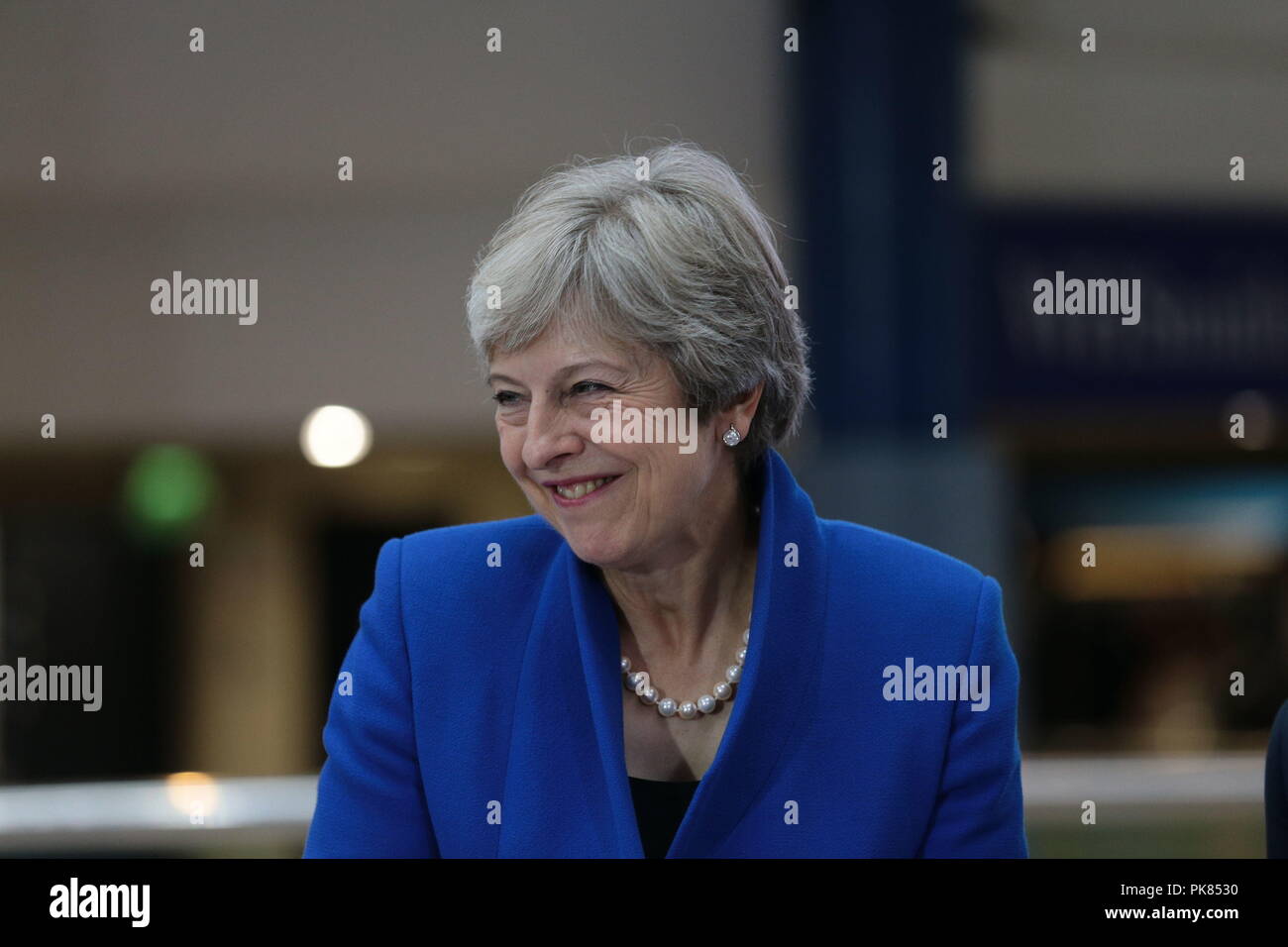 Prime Minister Theresa May during the Zero Emission Vehicle Summit at the ICC in Birmingham. Stock Photo