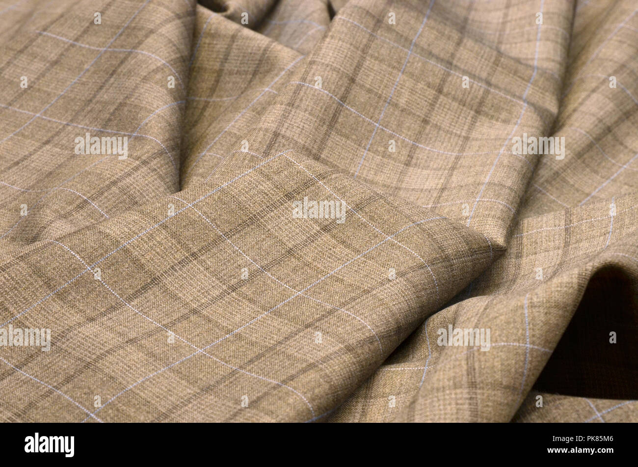 Woolen fabric, costume, brown-blue cage Stock Photo