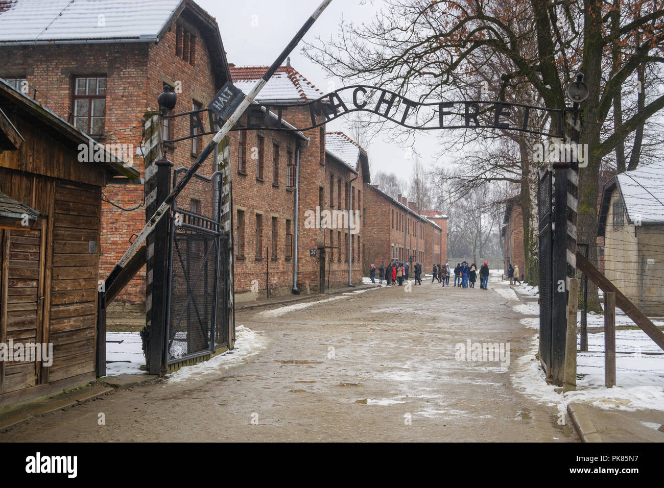 Auschwitz, Poland - February 16, 2018: Entrance to the Auschwitz Birkenau Concentration Camp Stock Photo