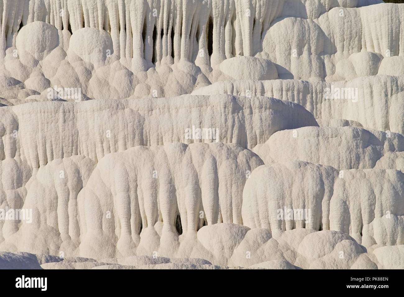 Travertine rock formations from calcium deposits Stock Photo