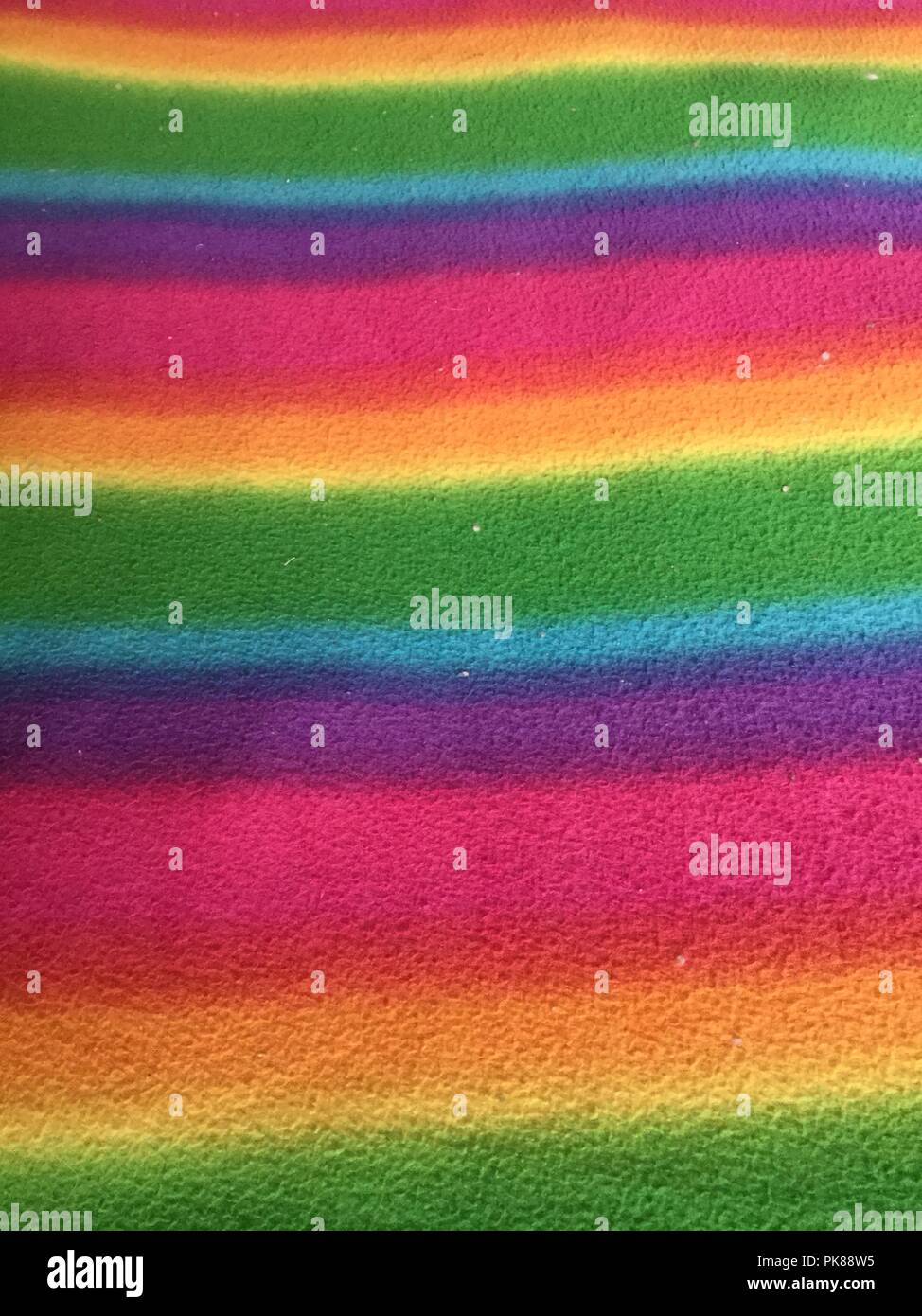 Bars of horizontal color on soft fabric. Stock Photo