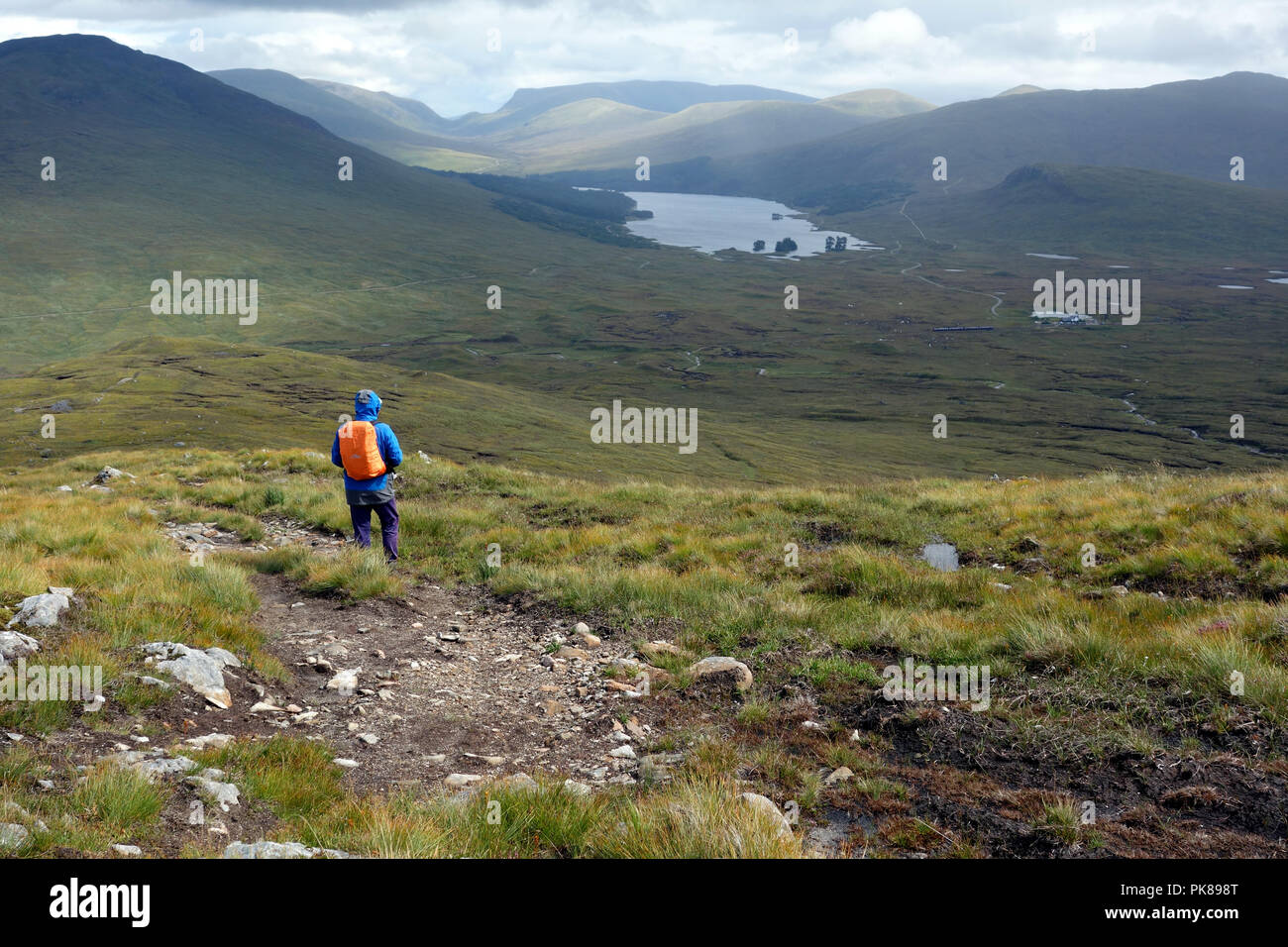 Man Walking down the Scottish Mountain Corbett Leum Uilleim with Loch ...