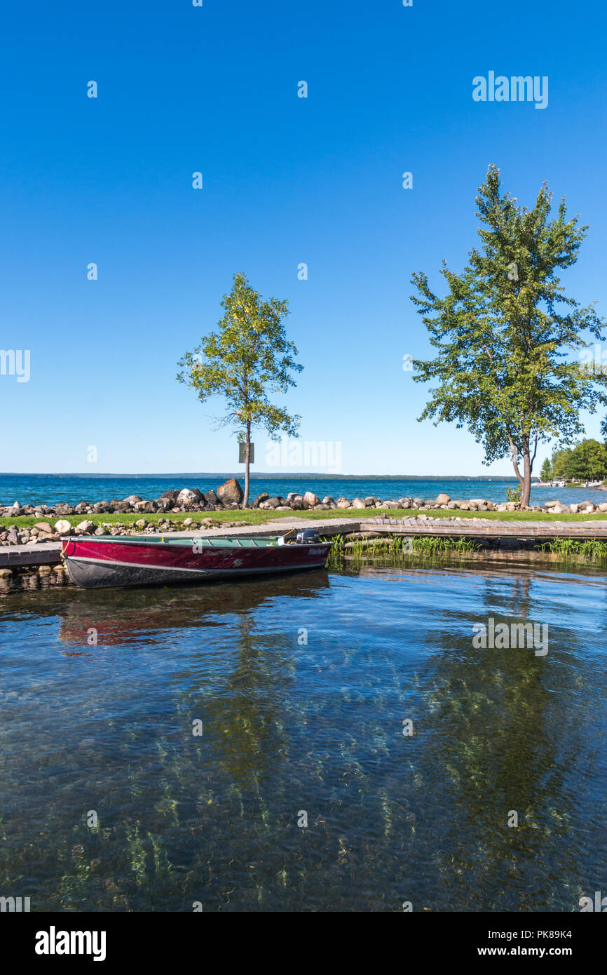 Lake Manitou shoreline fishing boat moored at dock on Manitoulin Island Stock Photo Alamy