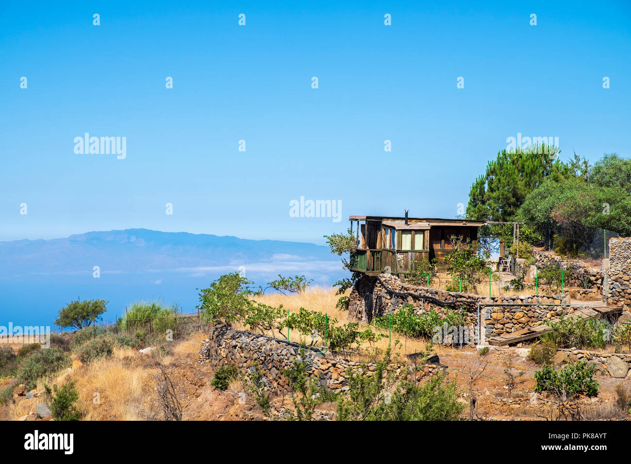 Rough built shanty hut on a finca in a remote area of Guia de Isora, with fabulous views to La Gomera, Tenerife, Canary Islands, Spain Stock Photo