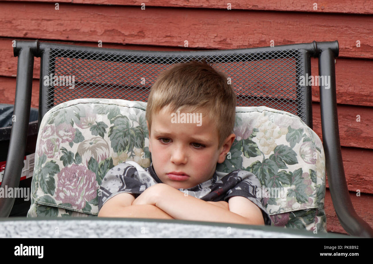 Child with arms folded pouting hires stock photography and images Alamy