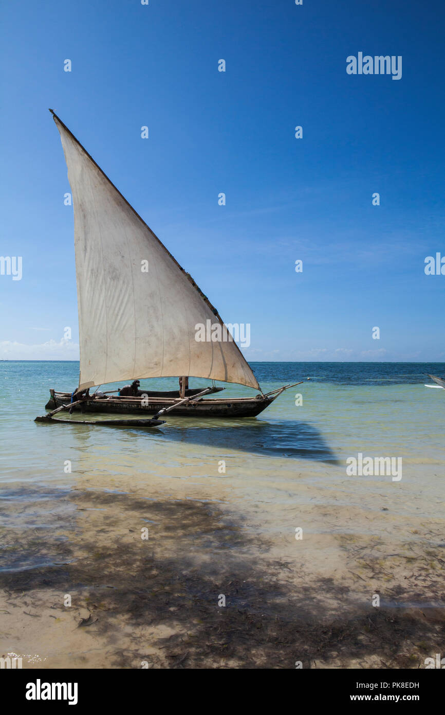 GALU - KINONDO, KENYA - JANUARY 26, 2018:Traditional african fishing boat , made of mango tree, in a Galu beach, Kenya Stock Photo