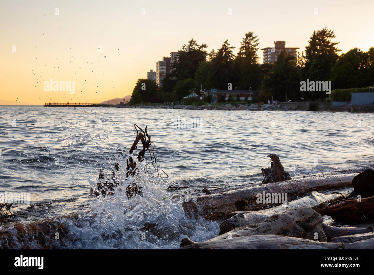 Waves crushing on the beach during a vibrant sunset. Taken in Ambleside