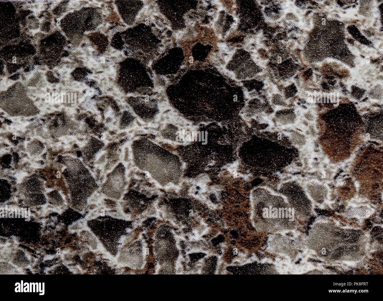 Brown rock surface. Random granite surface patter background. Stock Photo
