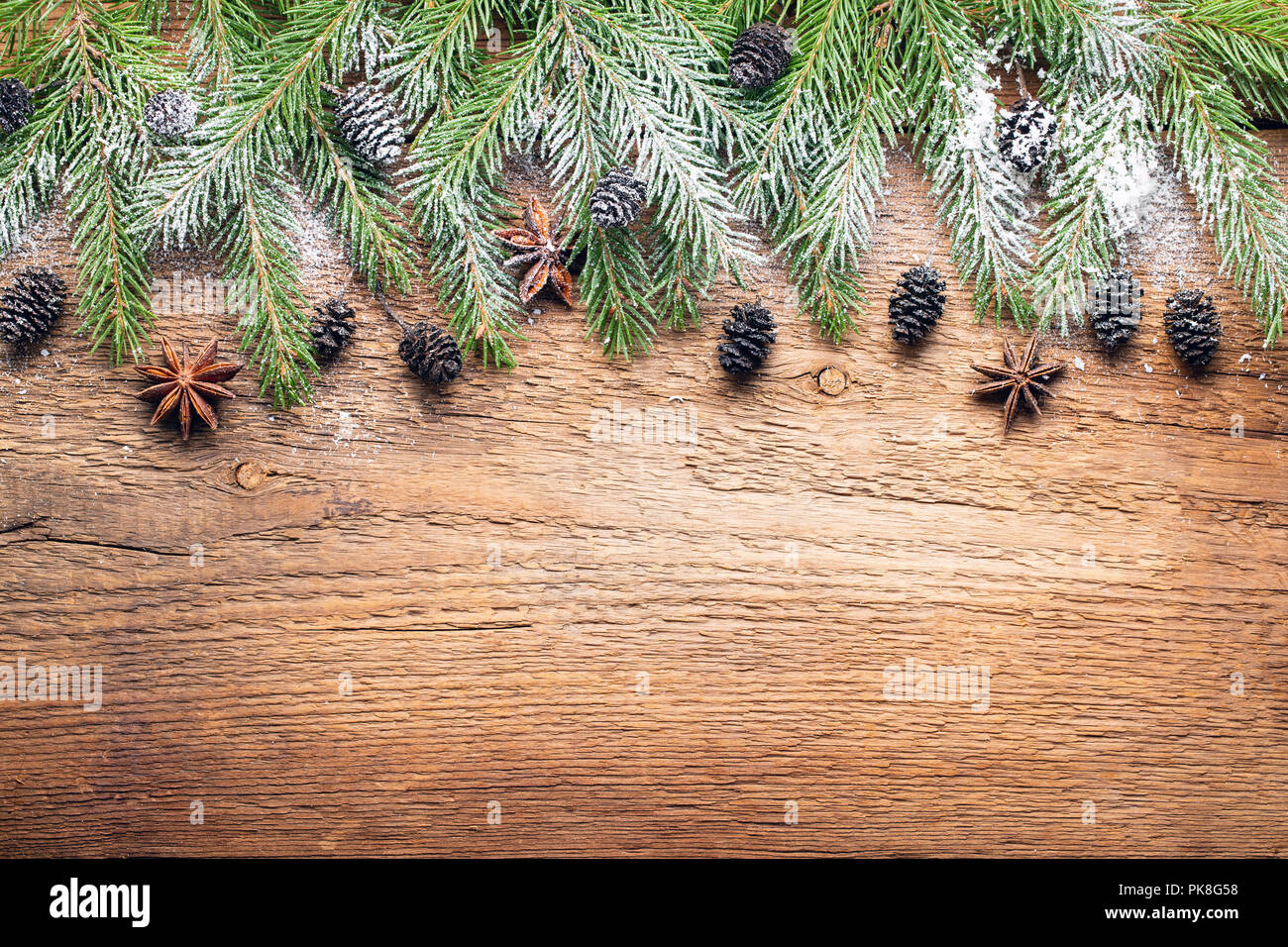 Christmas wooden background with snow fir tree. Top view with copy ...