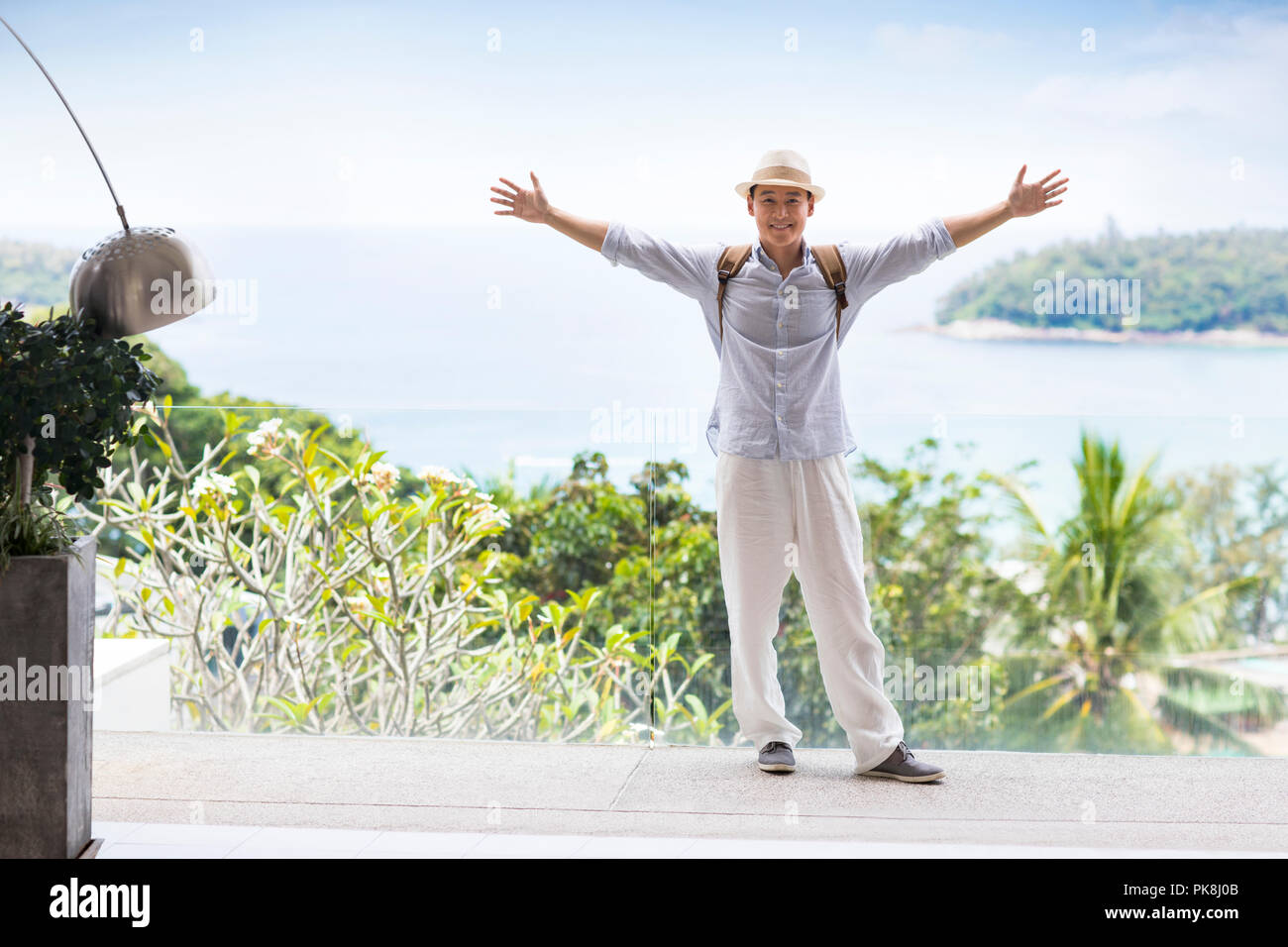 Happy young man on vacation Stock Photo