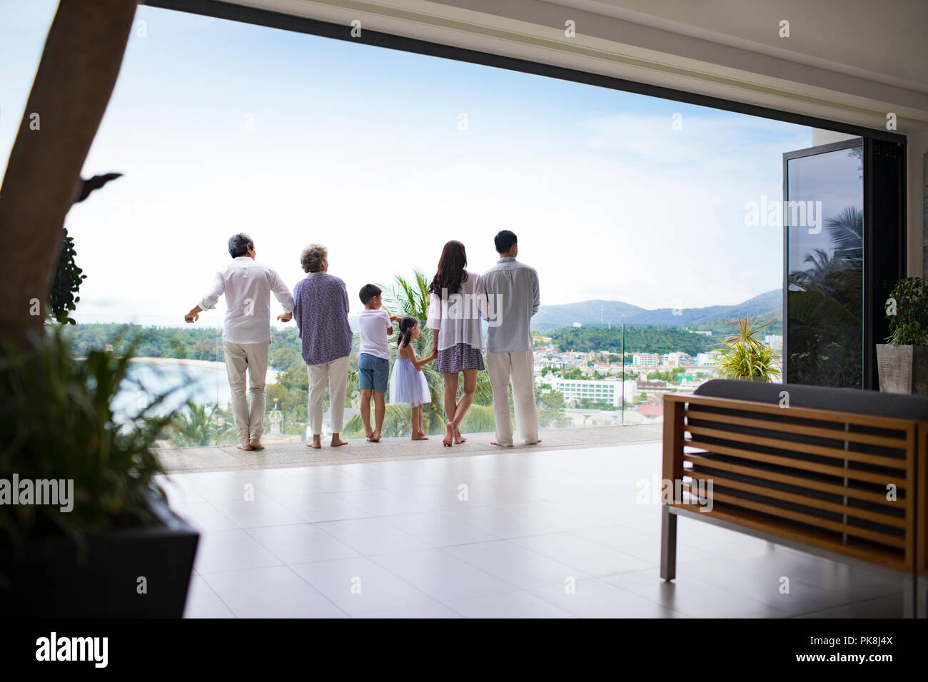 Happy family on vacation Stock Photo - Alamy