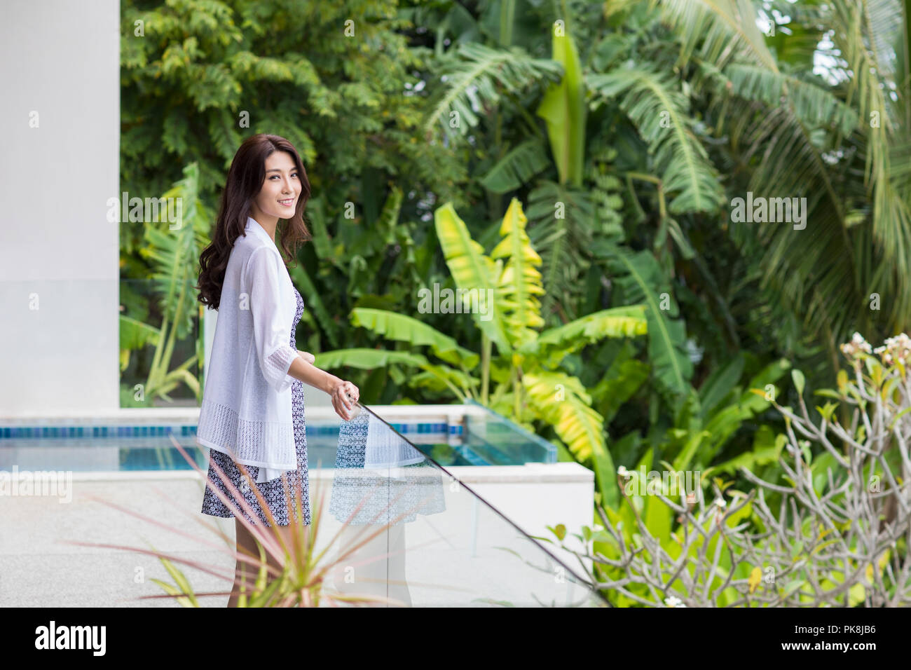 Indian woman standing in balcony hi-res stock photography and images ...