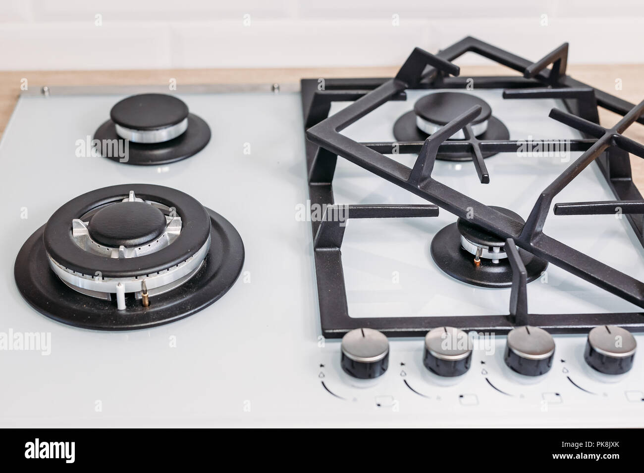 Gas control panel hob in kitchen close up Stock Photo - Alamy