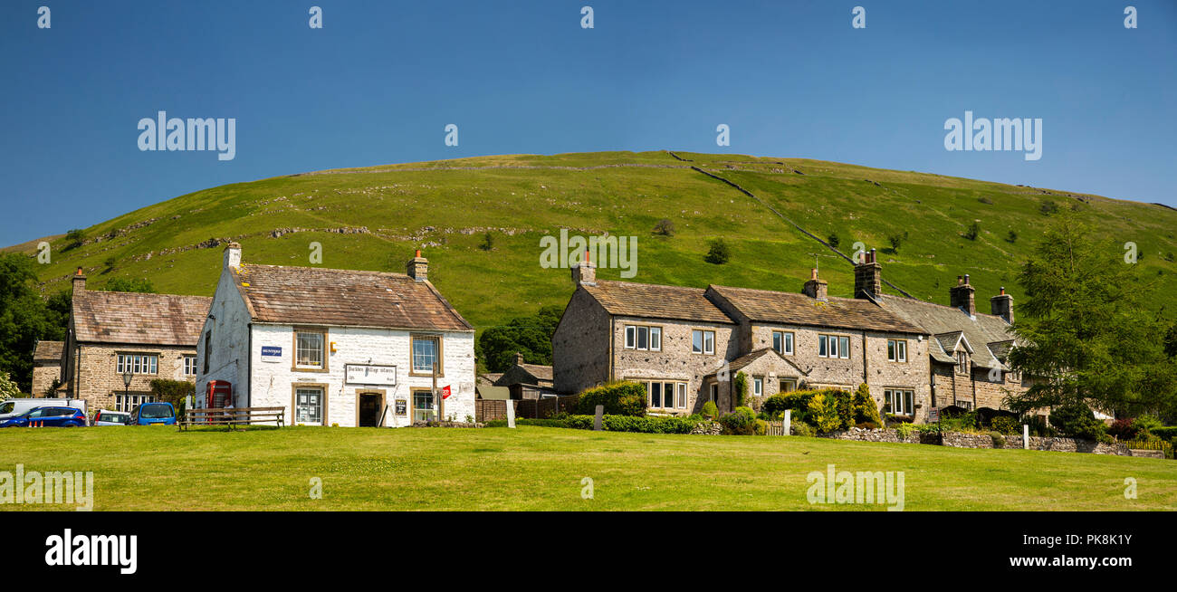 UK, Yorkshire, Wharfedale, Buckden, village stores and houses around the green, panoramic Stock Photo