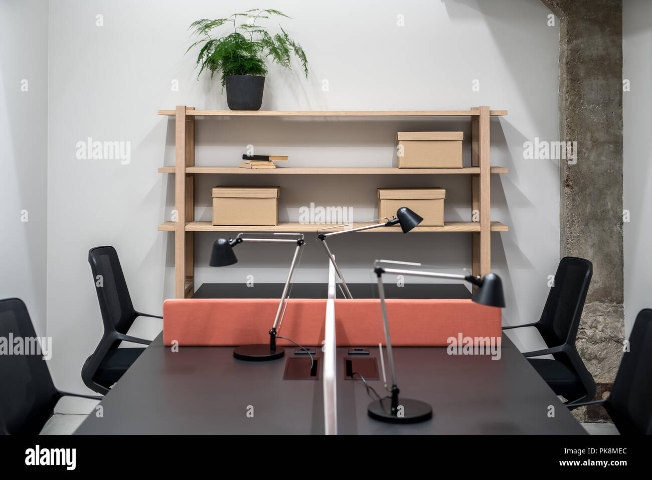 Stylish office in loft style with gray walls Stock Photo Alamy