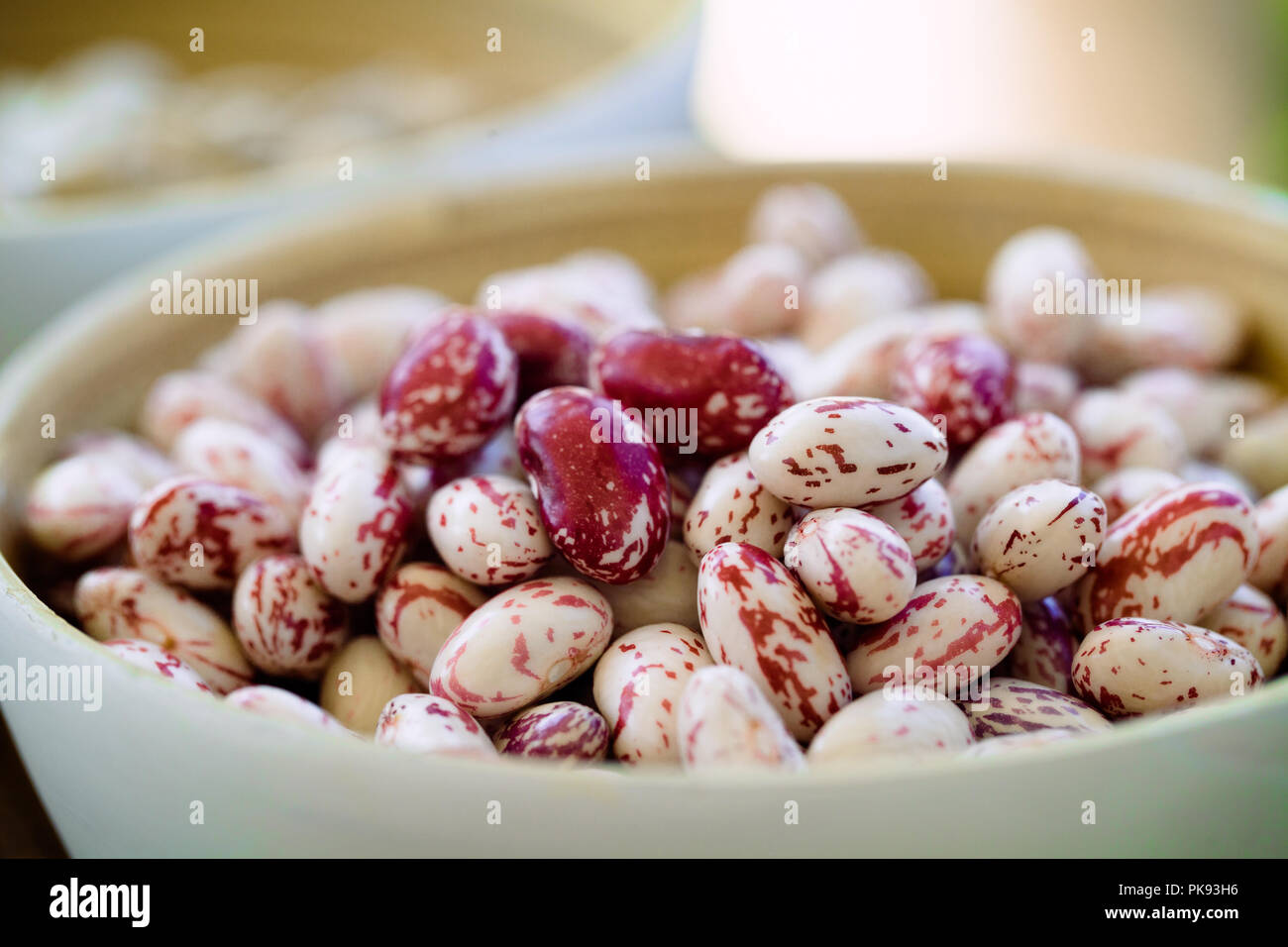 Preparing Ingredients for Cooking. Fresh Beans on Table Stock Photo