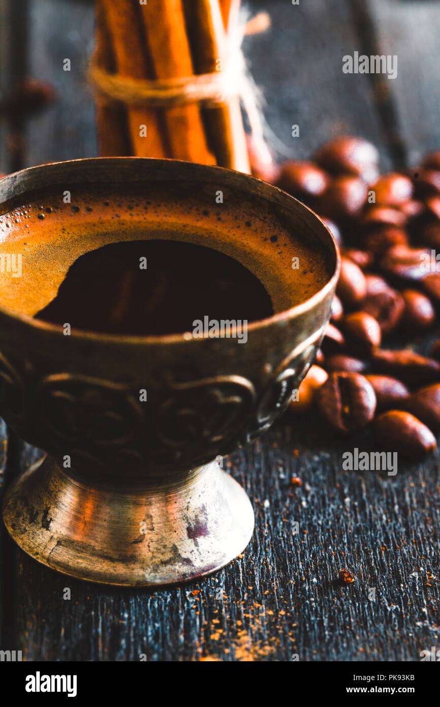 Coffee. Cup of turkish coffee with sugar. Vintage coffee with cinnamon