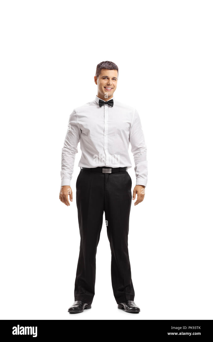 Full length portrait of a young man in a tux isolated on white background Stock Photo