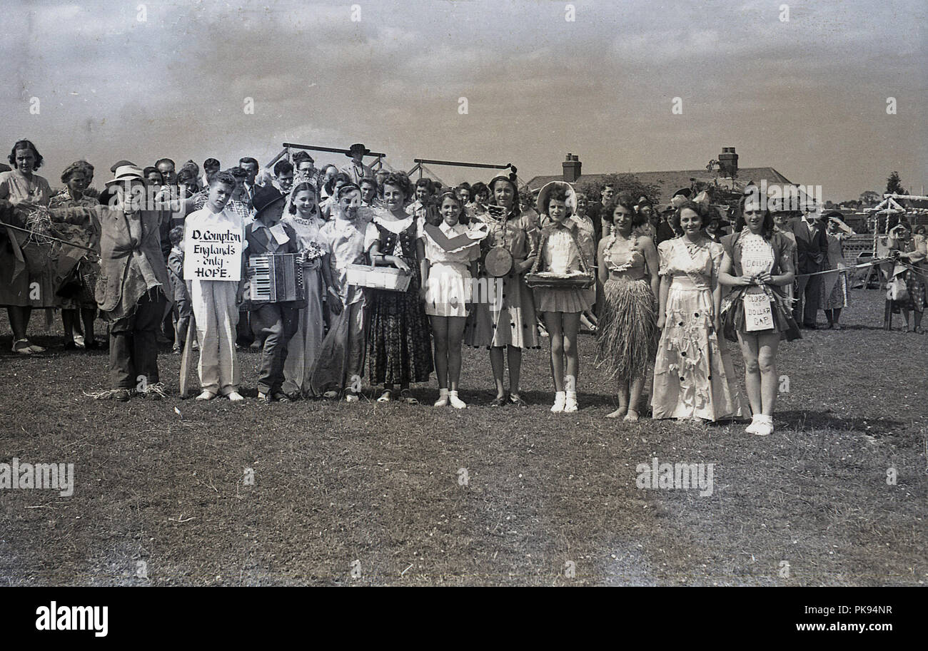 1950, historical, girls and boys taking part in a fancy-dress competition  at a summer fete or fair line-up together outside in their costumes,  England, UK Stock Photo - Alamy