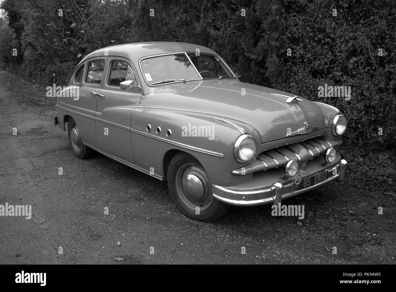 A classic 1950s Simca Vedette powered by a Ford V8 in the hamlet of St Martial, Varen, Taren et Garonne, Occitanie, France, Europe in the autumn Stock Photo