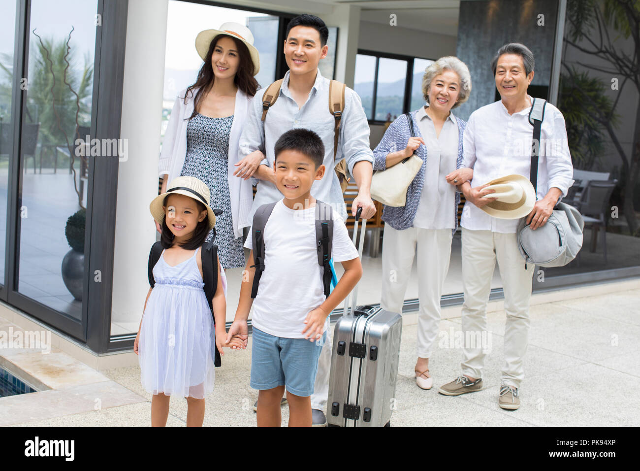 Happy family on vacation Stock Photo - Alamy