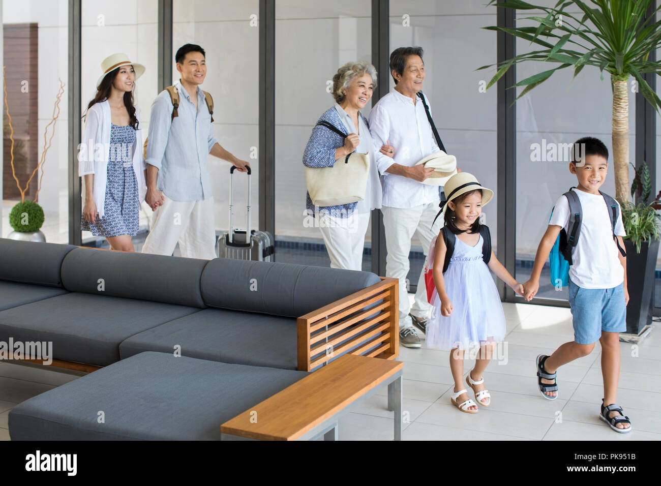 Happy family on vacation Stock Photo - Alamy